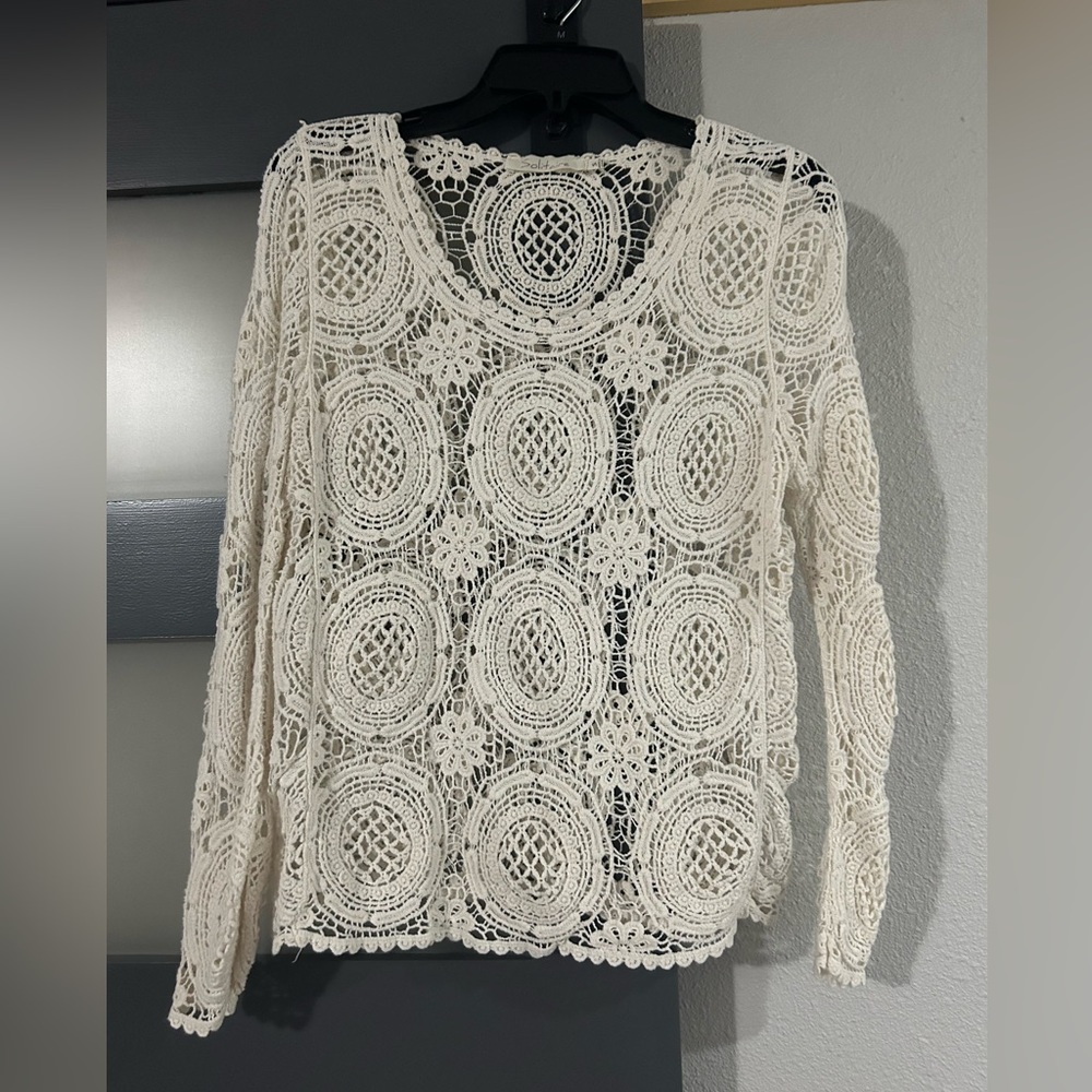 Cream crochet long sleeve size small.